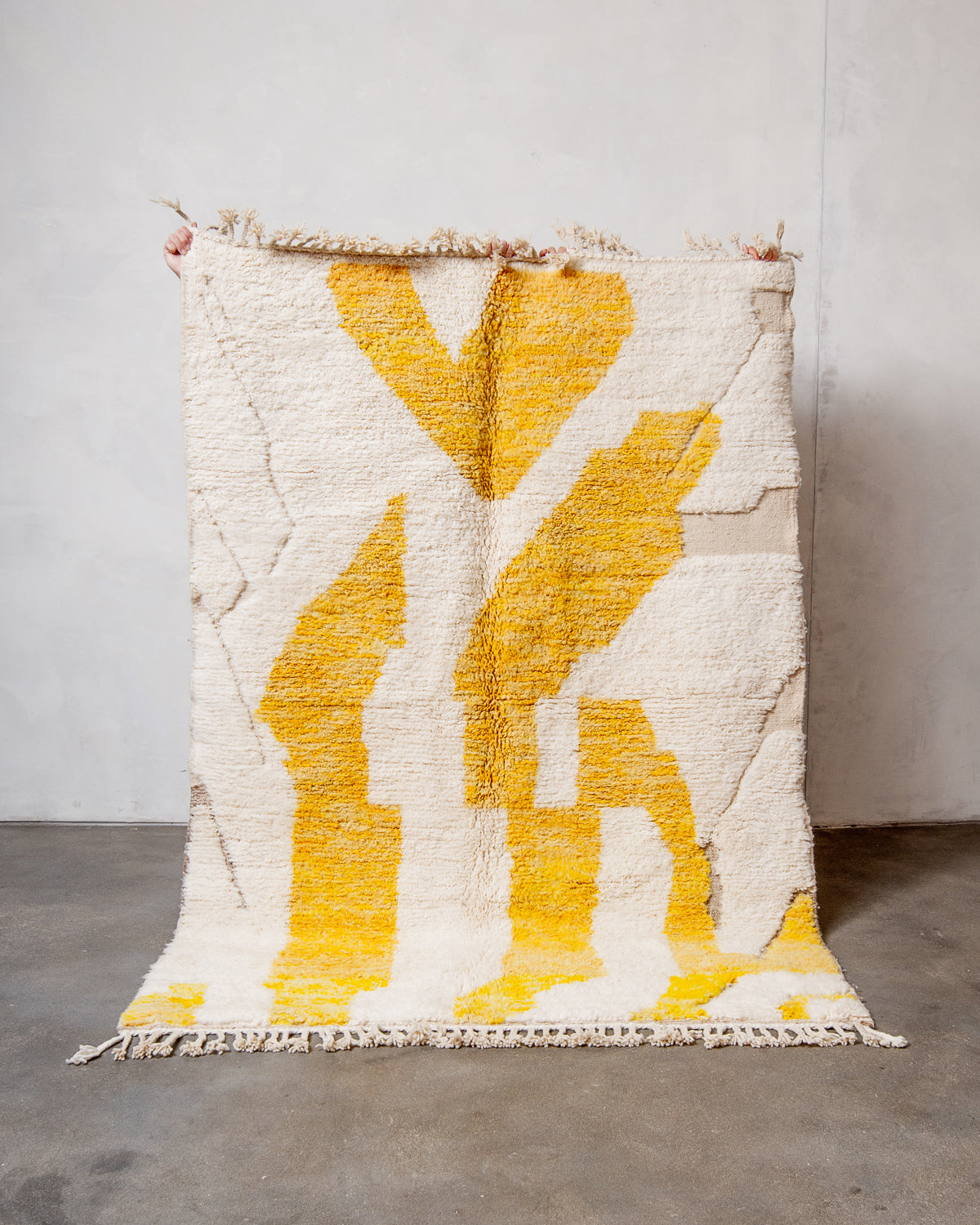Modern, designer, handcrafted Berber rug from Morocco. Beniourain carpet with beautiful colours and patterns and fluffy wool texture.